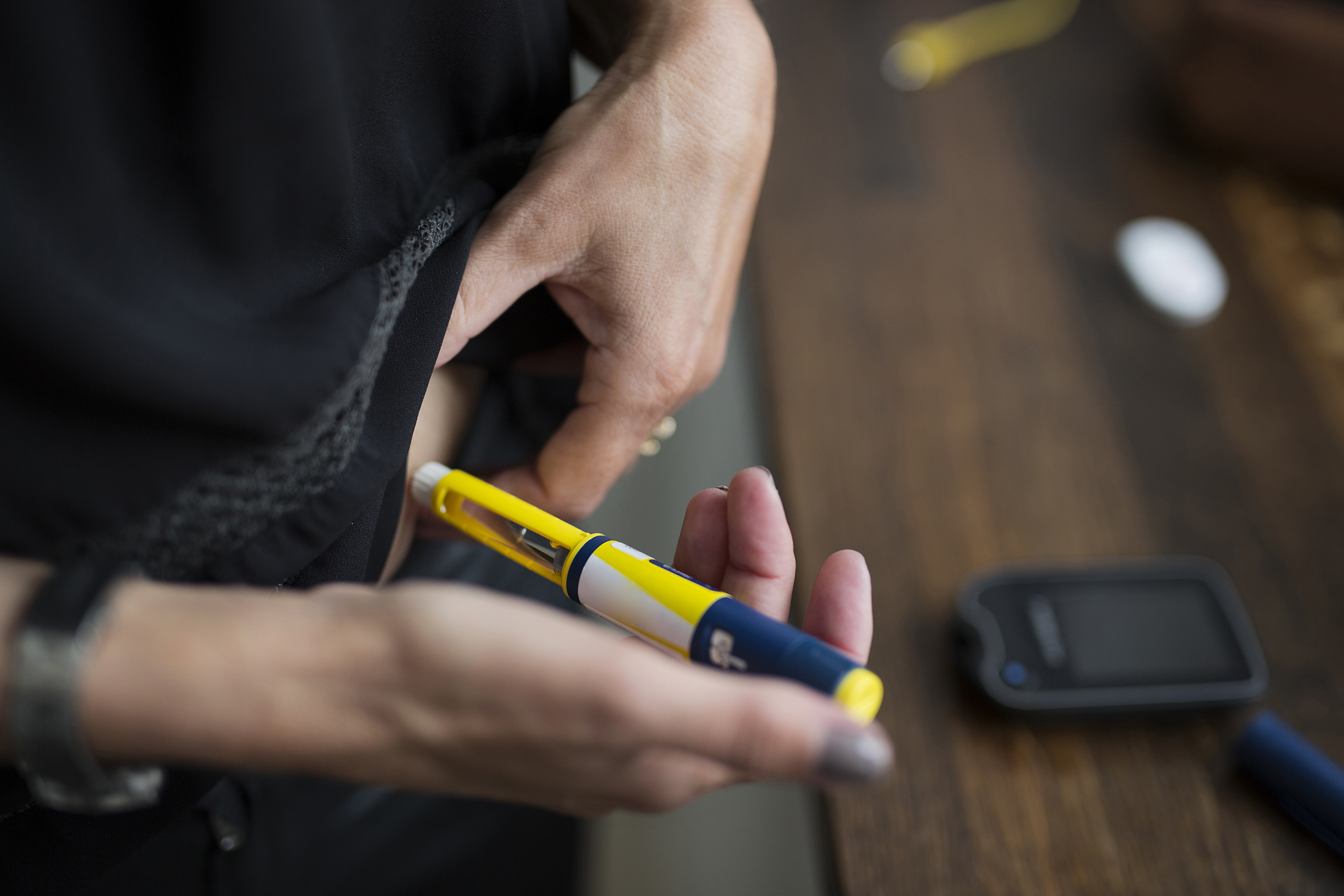 Billede af injektion af insulin med insulinpen.